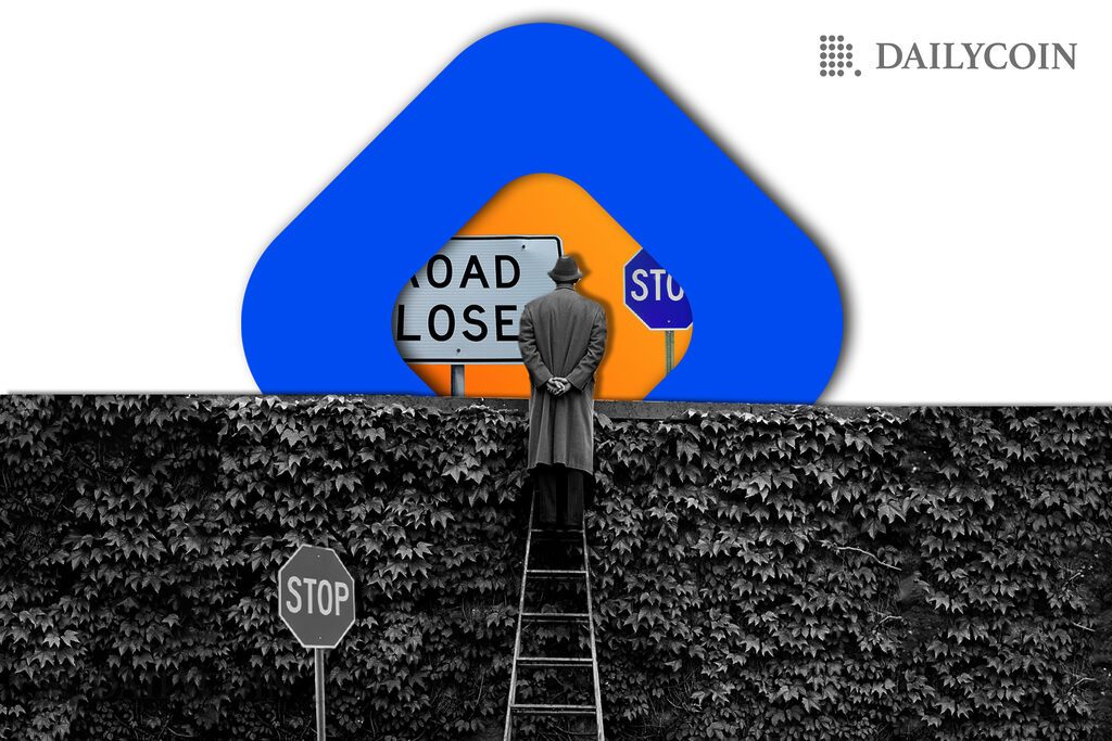 A person is standing on the ladder and looking at a blue road sign behind the gray hedge