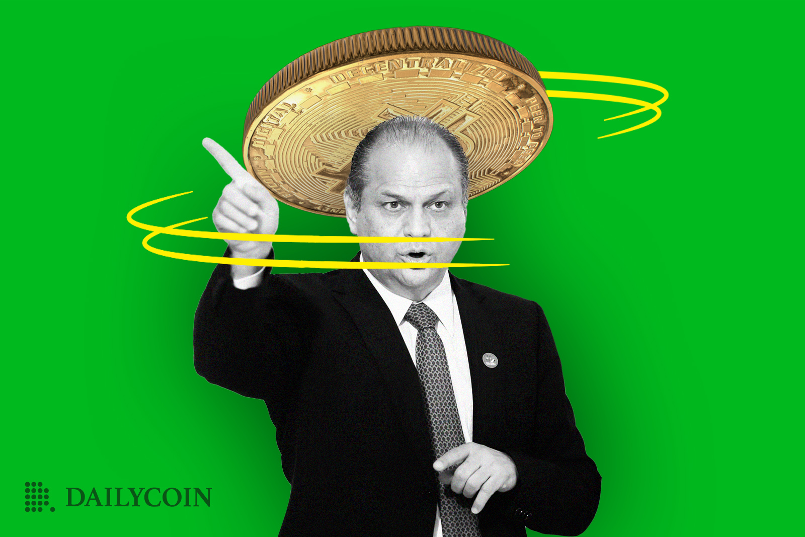 Ricardo Barro with spinning giant bitcoin on head pointing