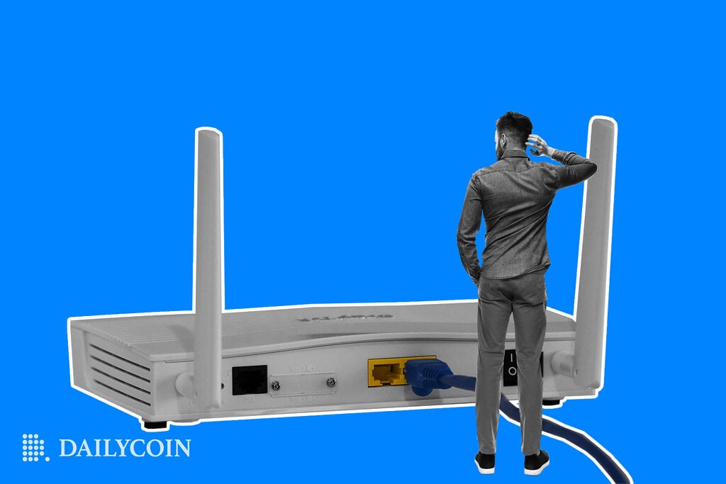 man standing near an old wifi router, perplexed