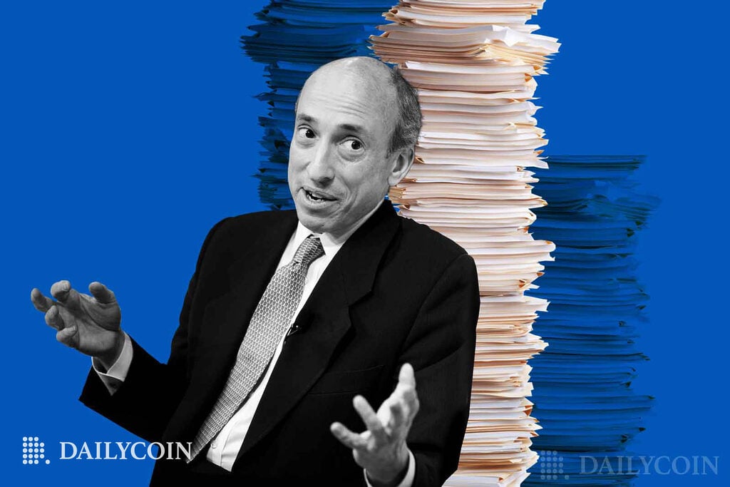 Gary Gensler in front of stacks of documents