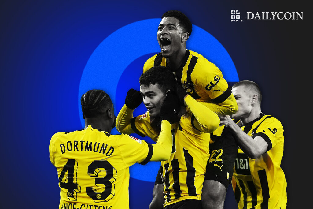German soccer club Borussia Dortmund (BVB) celebrating in front of Coinbase logo.