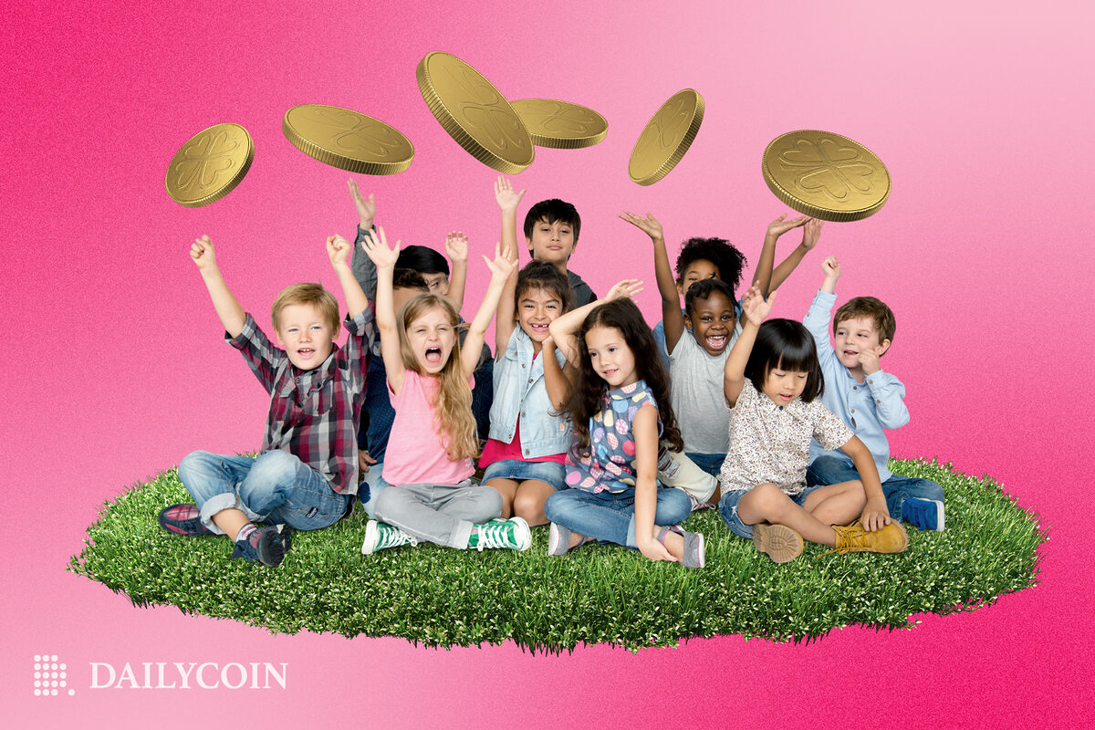 kids sit on the ground with the hands in the air catching crypto coins