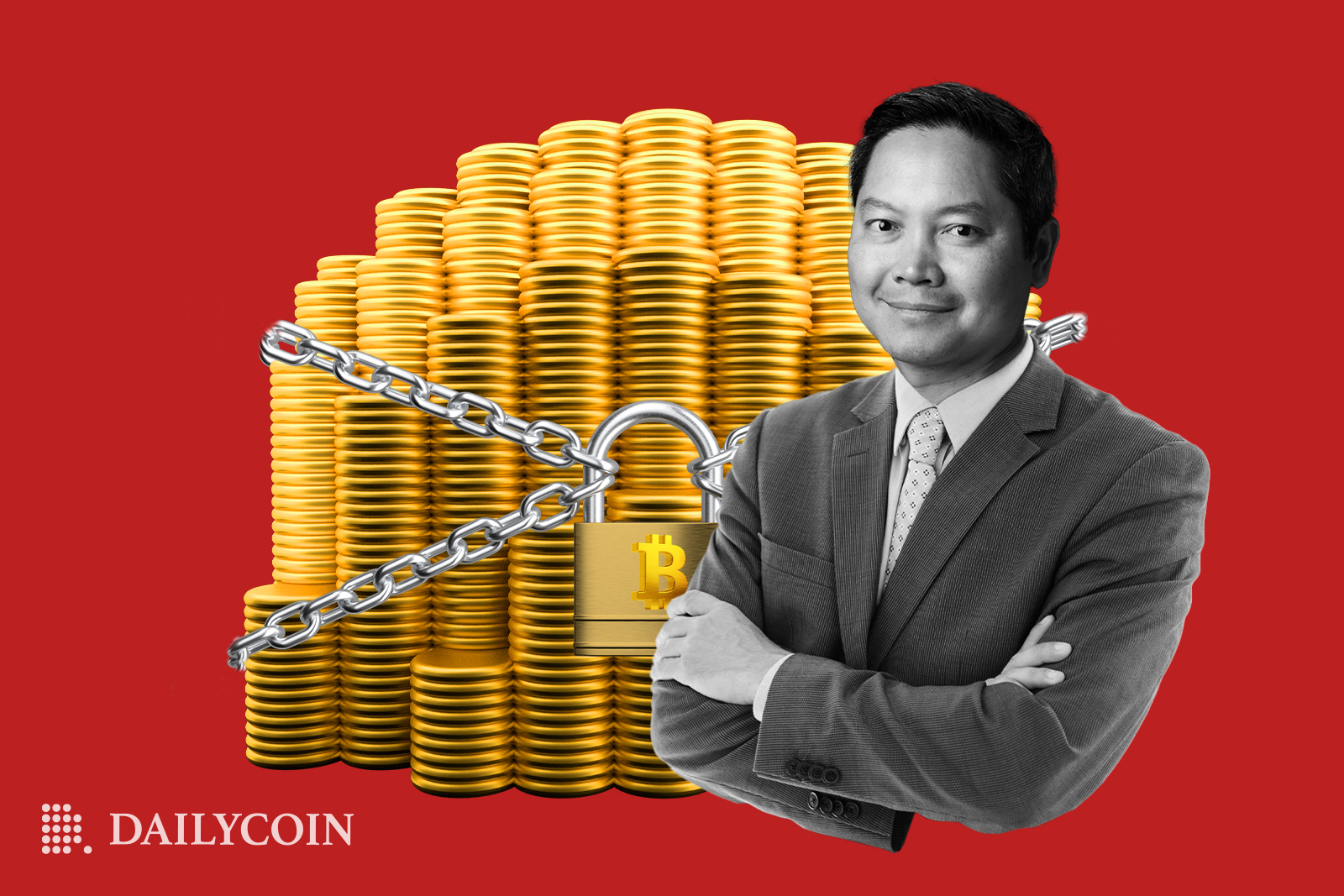 Microstrategy's Phong Lee stands with his arms crossed in front of piles of bitcoins. The piles are chained and padlocked