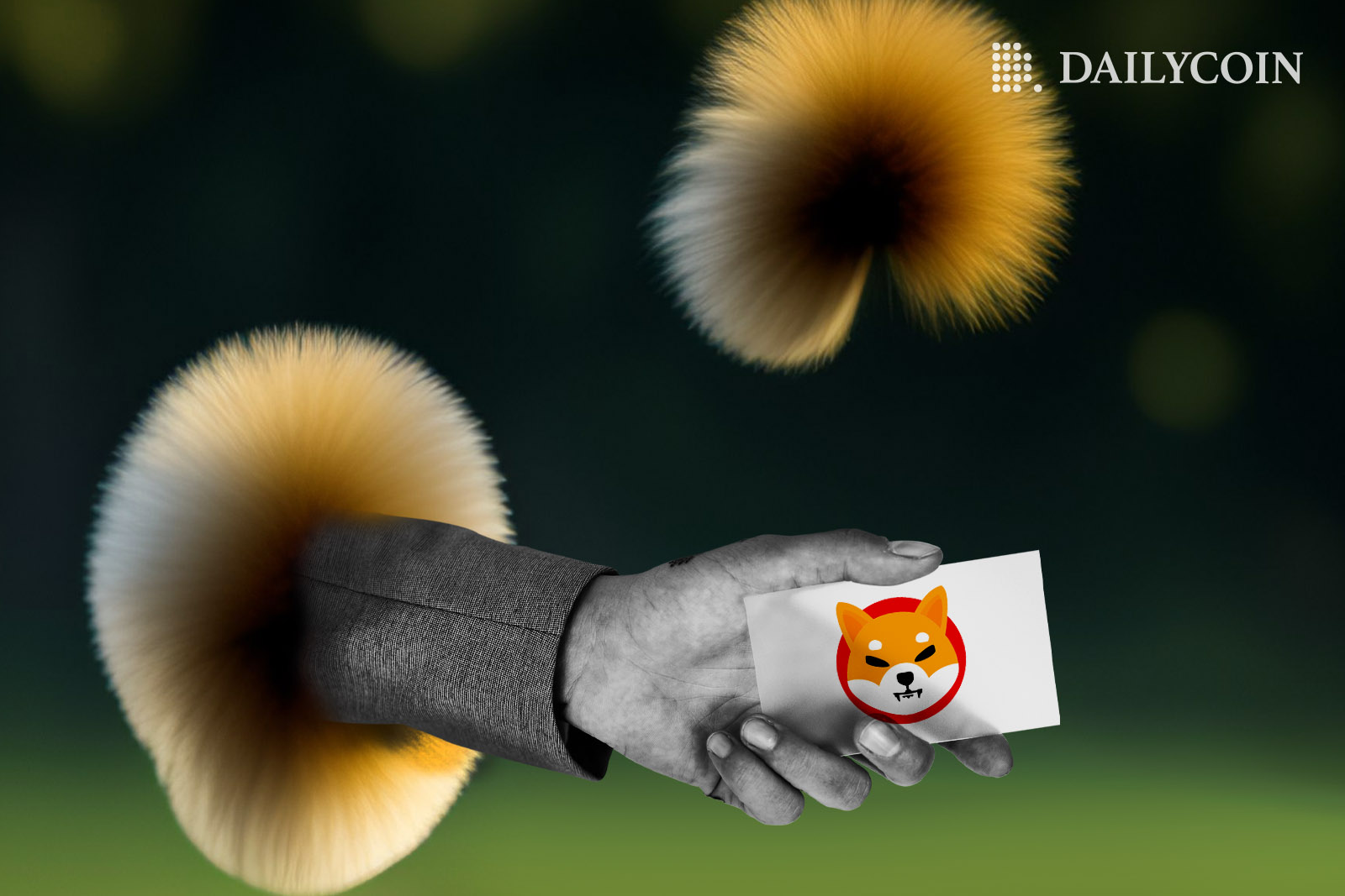 A human hand coming out of a soft bubble holding a Shiba Inu invitation card.
