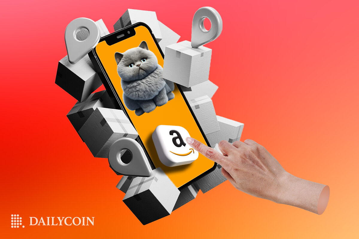 A mobile phone displaying a big grey cartoon cat and a square Amazon logo pressed by feminine hand