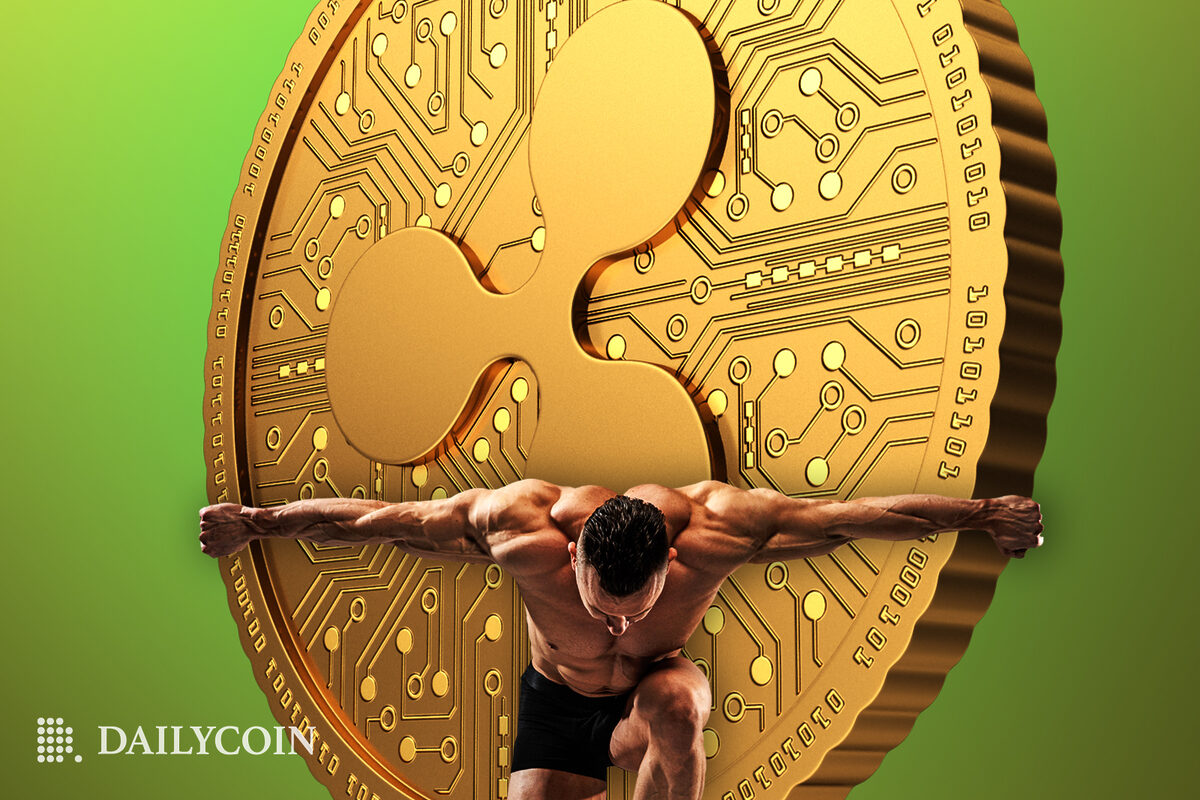 A strong man holding up a massive golden XRP token