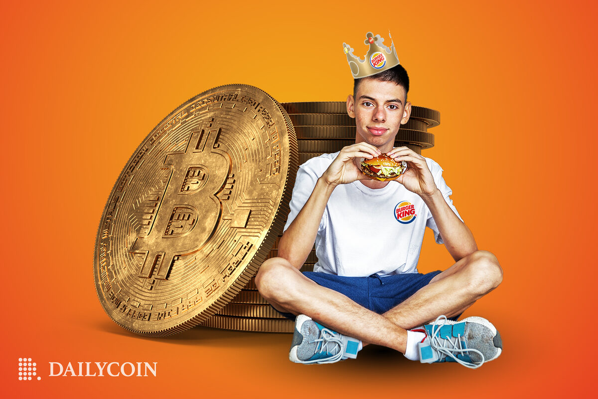 Teenager eating a Burger King Whopper that he paid for with crypto.