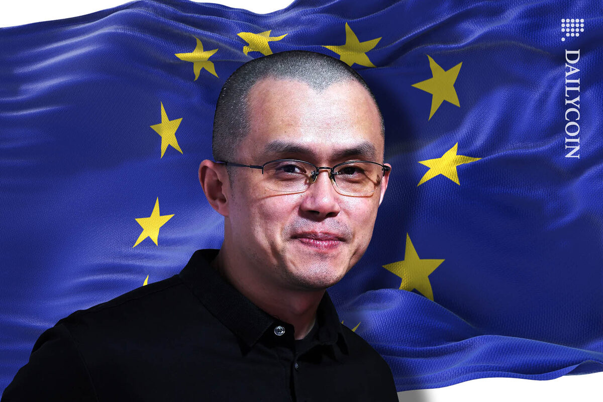 Changpeng Zhao infront of an EU flag.