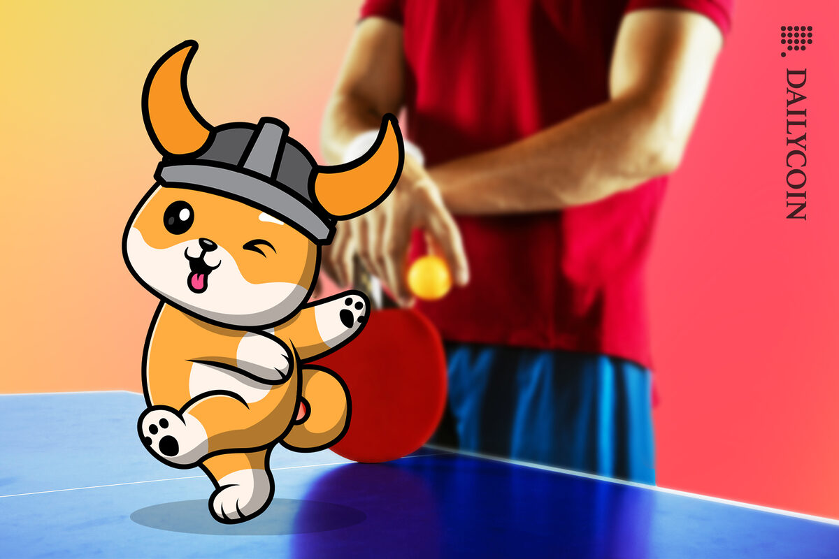 Floki dancing on a tennis table and winking, table tennis player behind waiting to play.