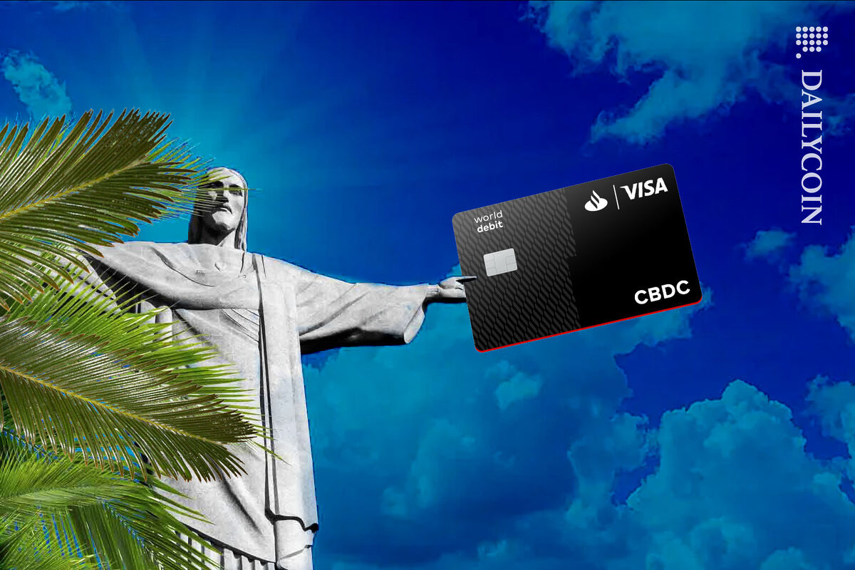 Christ the Redeemer statue holding a santander visa card.