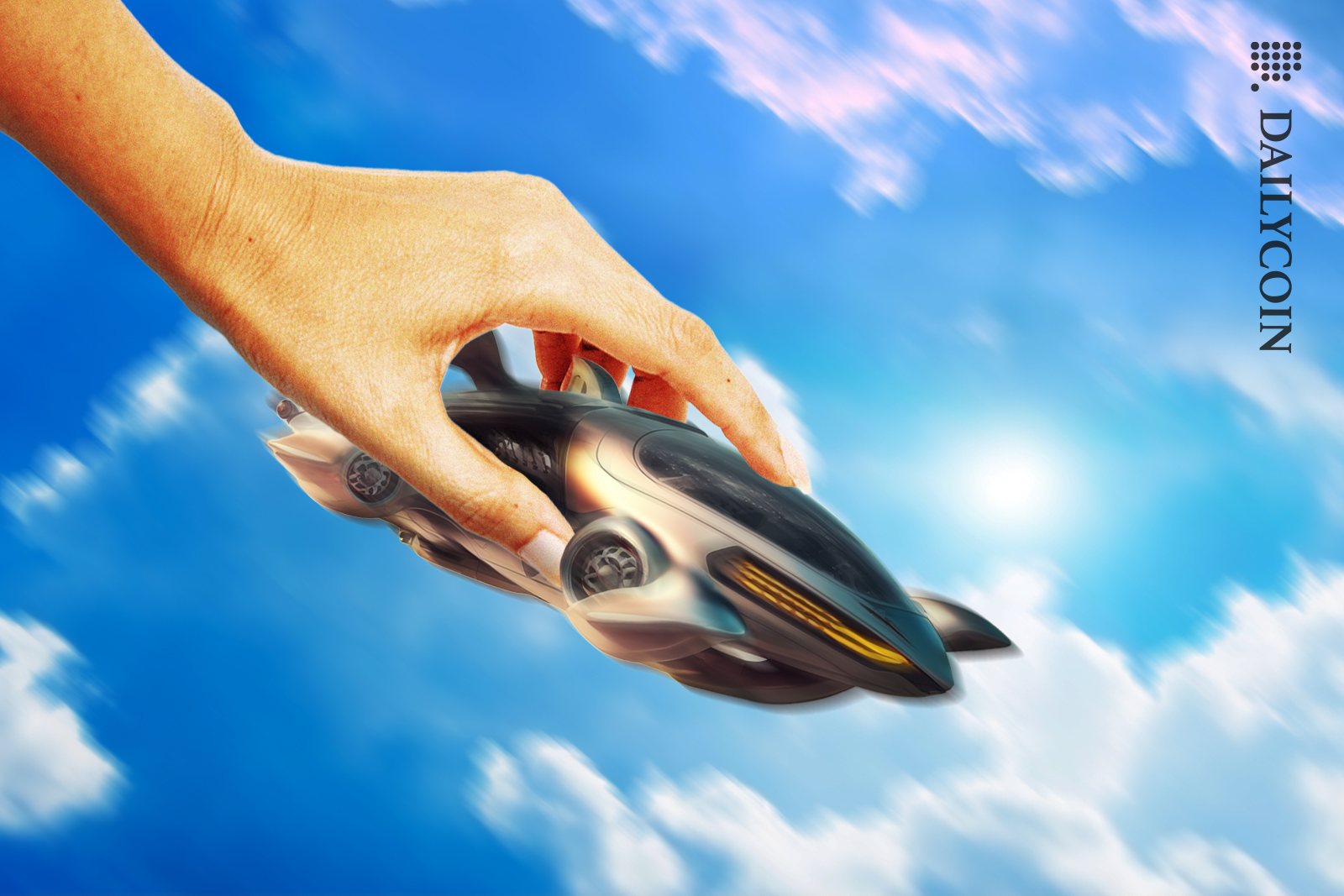 Big hand controlling futuristic spaceship toy through the sky.