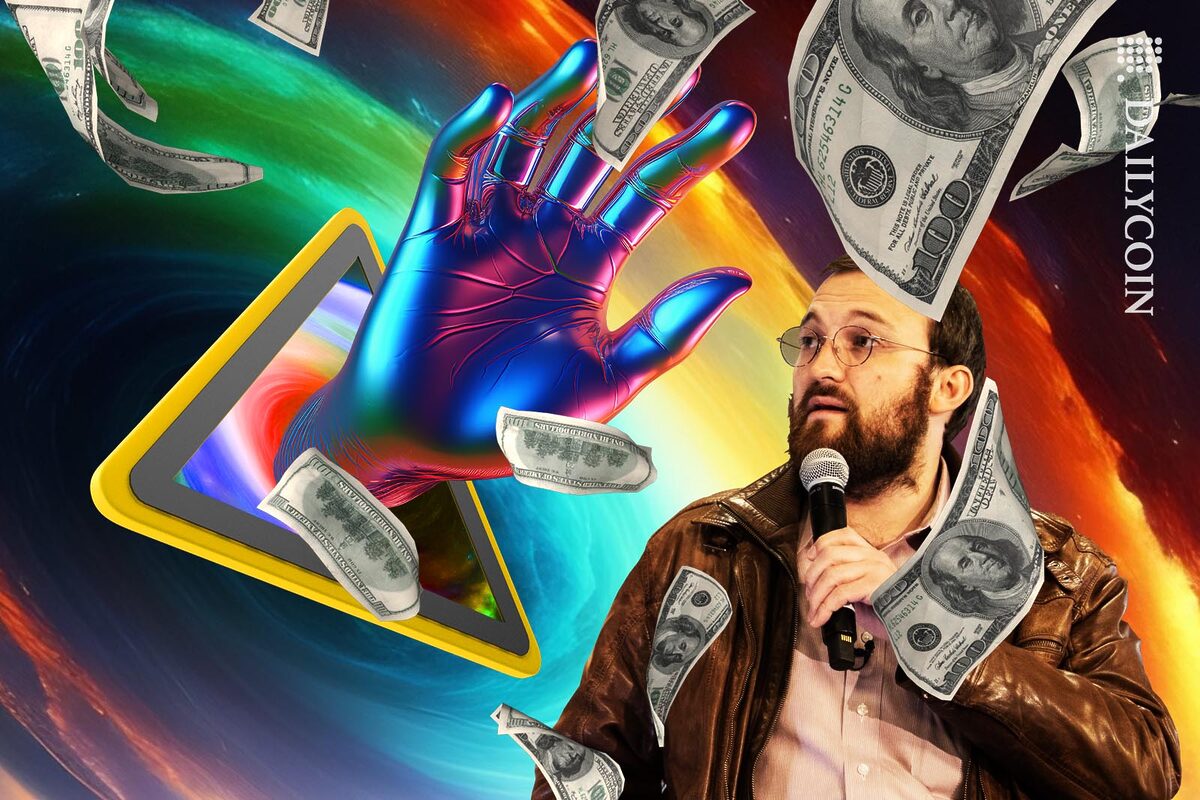 Charles Hoskinson looking at a huge colourful hand grabbing money appearing from a yello warning sign.