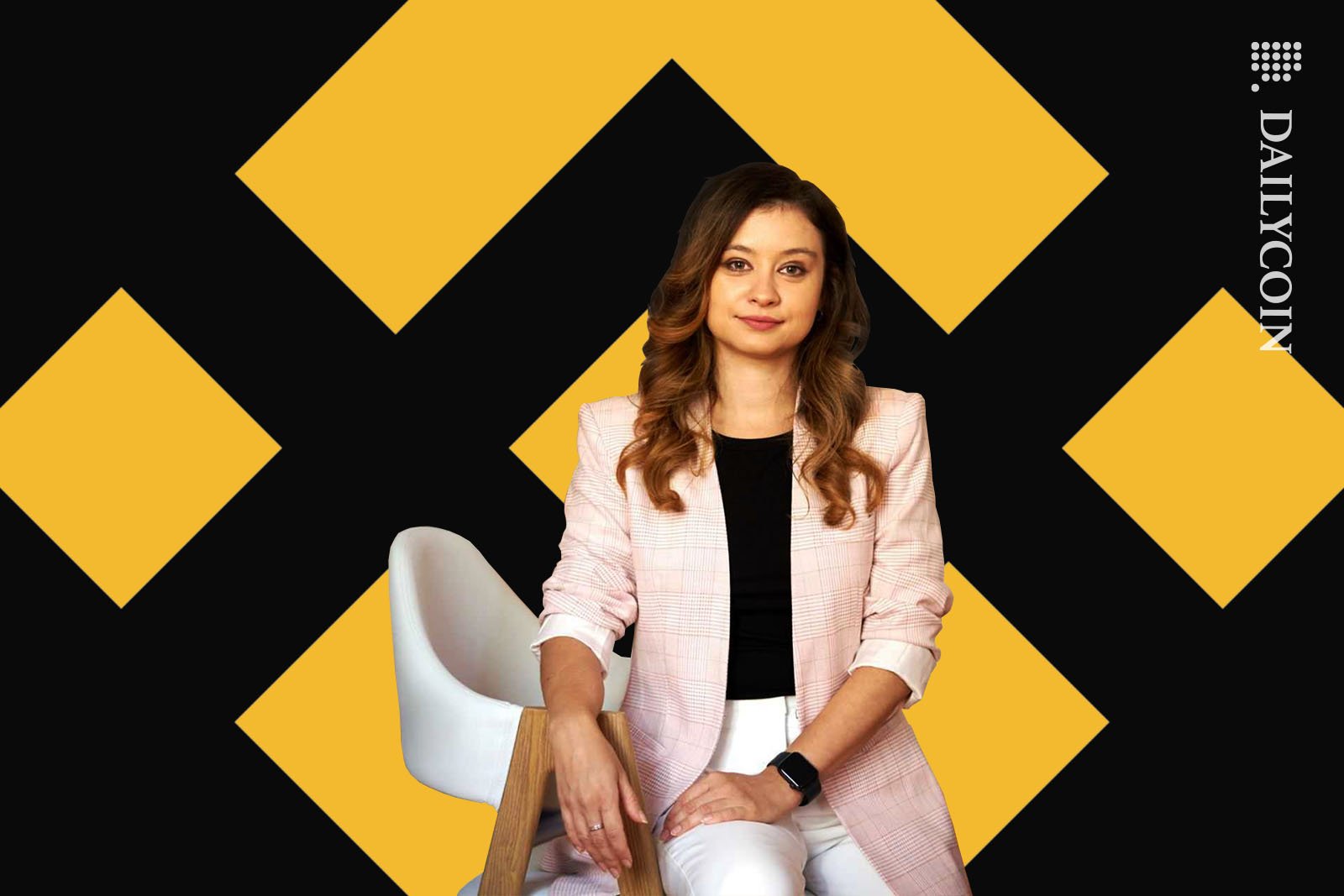 Katarzyna Wabik leaning on a chair infont of a big Binance logo.