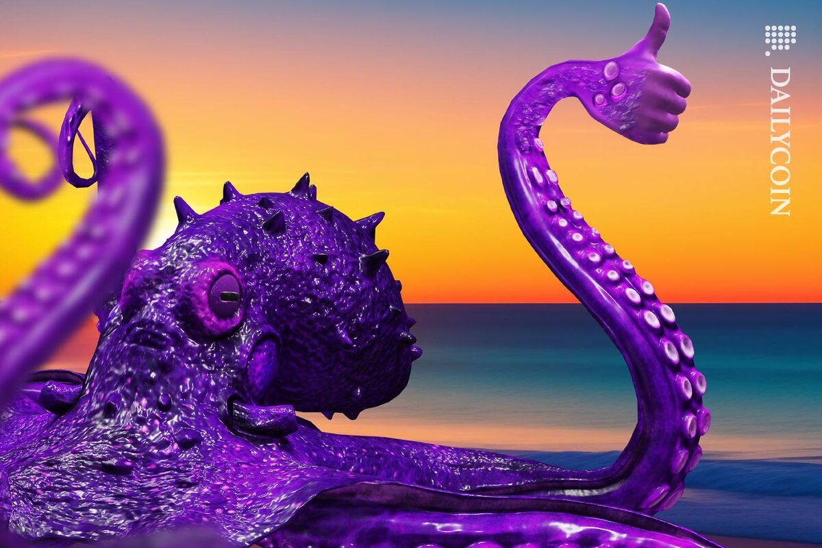 Purple octopus on a beach giving the thumbs up.