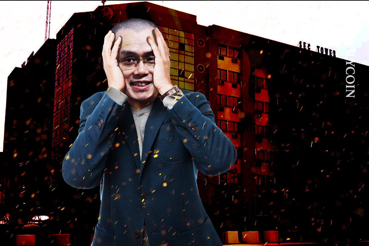 Changpeng Zhao of Binance holding his head in disbelief infront of the SEC Tower.