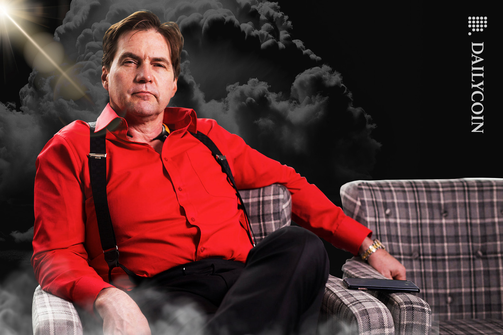 Dr. Craig Wright in a bright red shirt sitting in an armchair with a thretening look in his eyes.