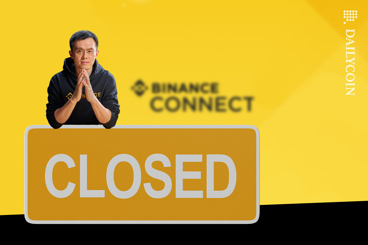 Changpeng Zhao leaning on a huge CLOSED sign infront of Binance Connect.
