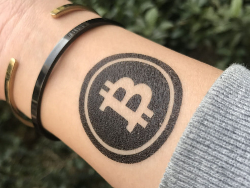 Bitcoin logo crypto tattoo.