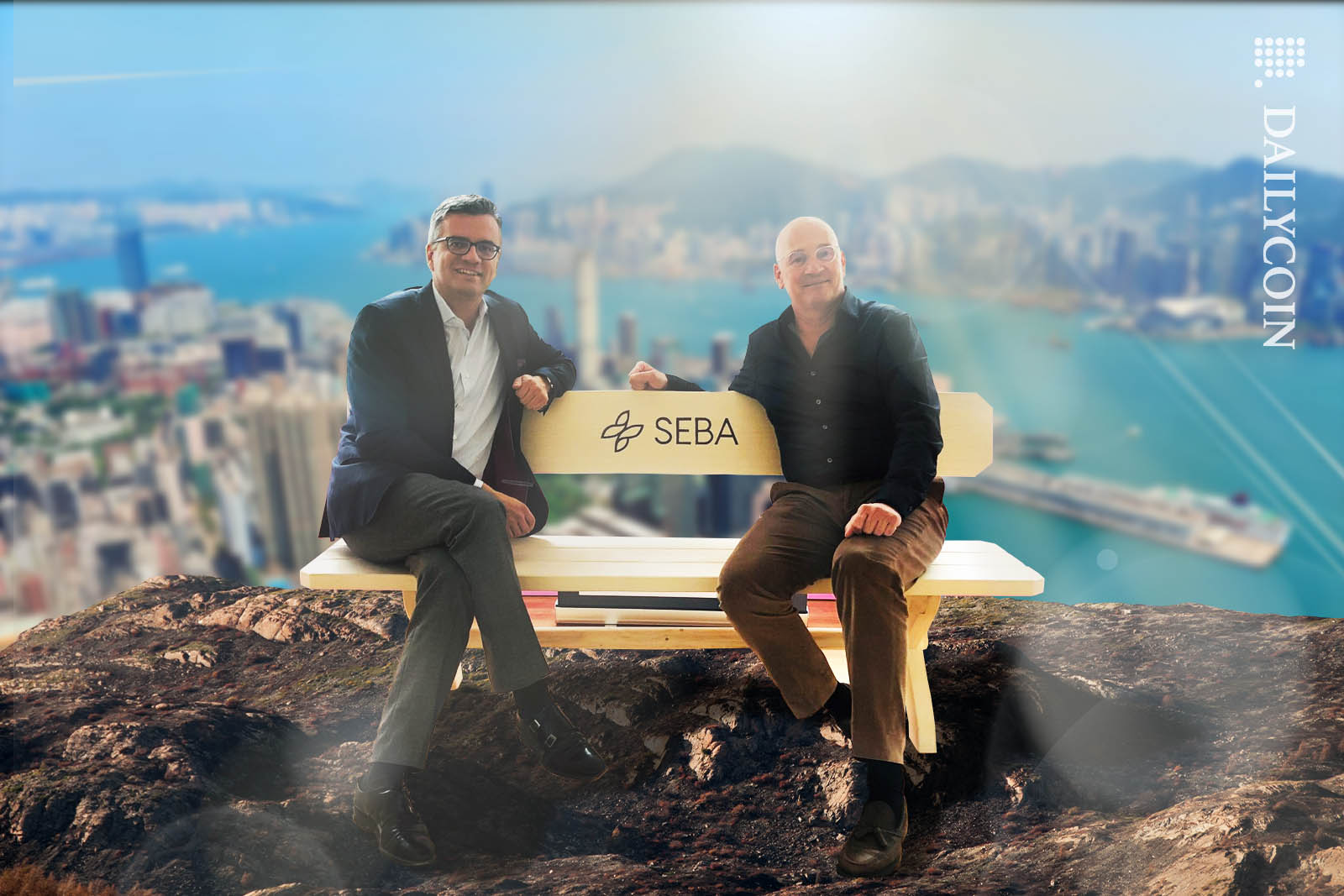 Seba CEO sitting on a bench with a man overlooking Hong Kong.