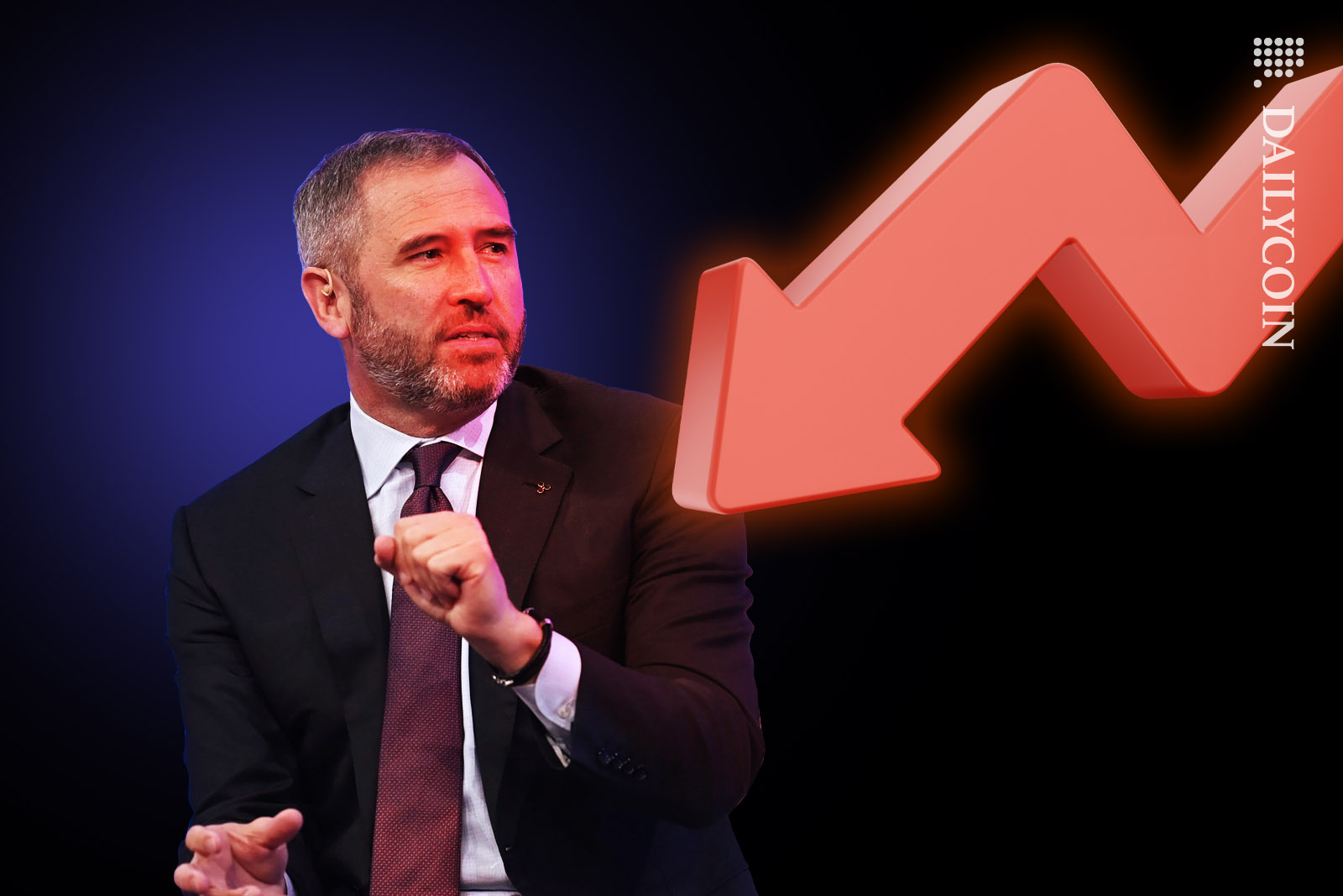 Brad Garlinghouse looking worried about a big red downward arrow next to him.