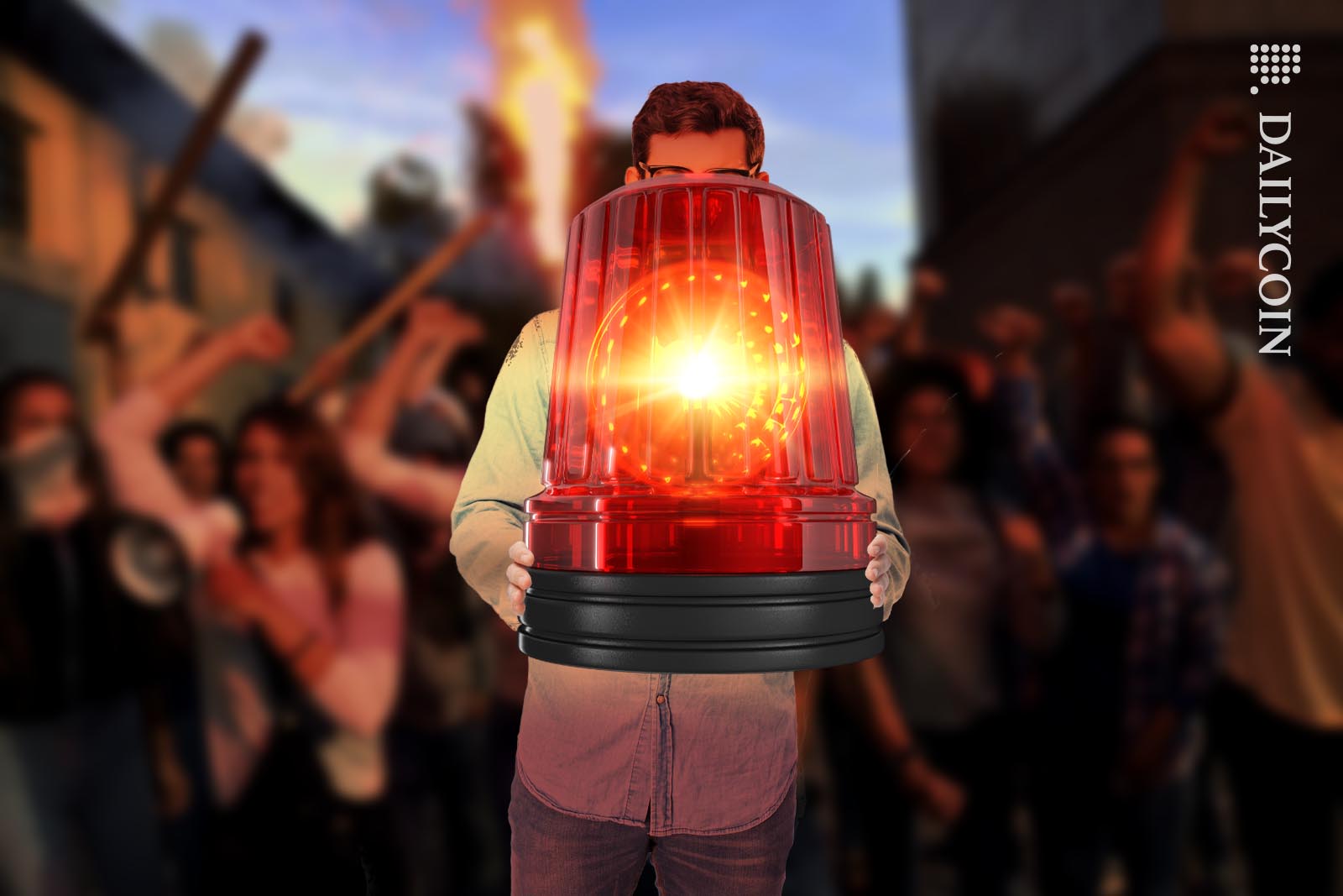 Man holding a huge alarm light with an angry crowd behing him.