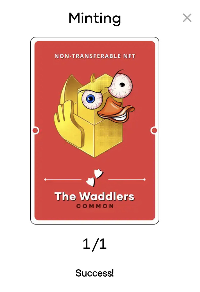 A Duckling trading card NFT demonstrating the results of minting. The card is red with a simple yellow deck made of geometric shapes. The top caption reads "non-transferable NFT". The bottom caption reads "The Waddlers - Common".