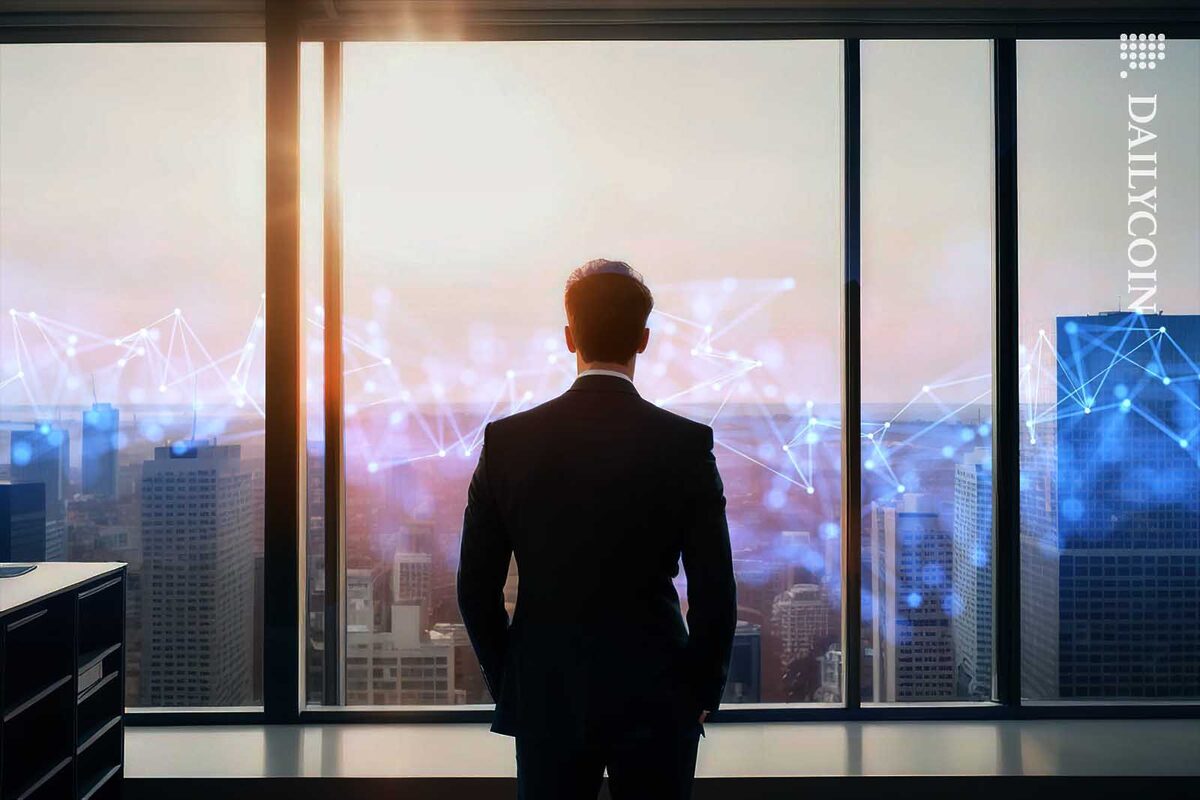 Suited man staring out of a window at a city skyline in a blockchain haze.