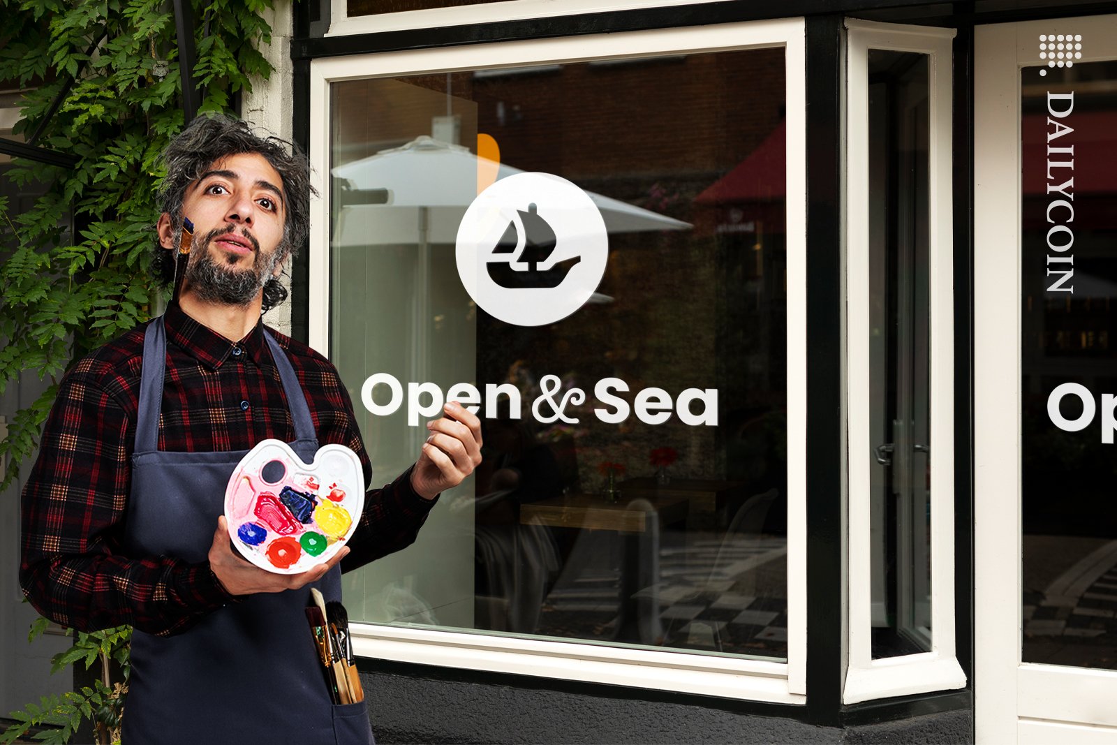 An artist standing outside of the OpenSea shop.