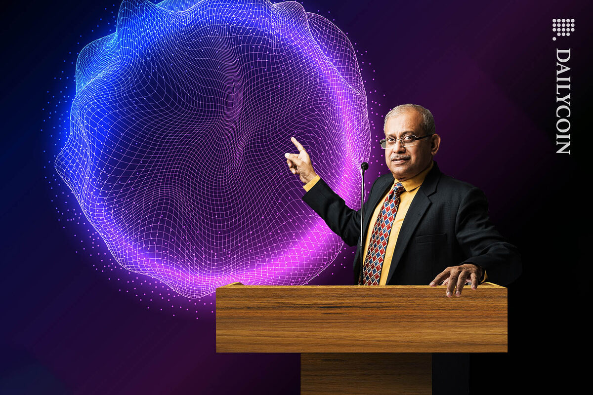 Man in suit pointing at a wireframe sphere behind him.