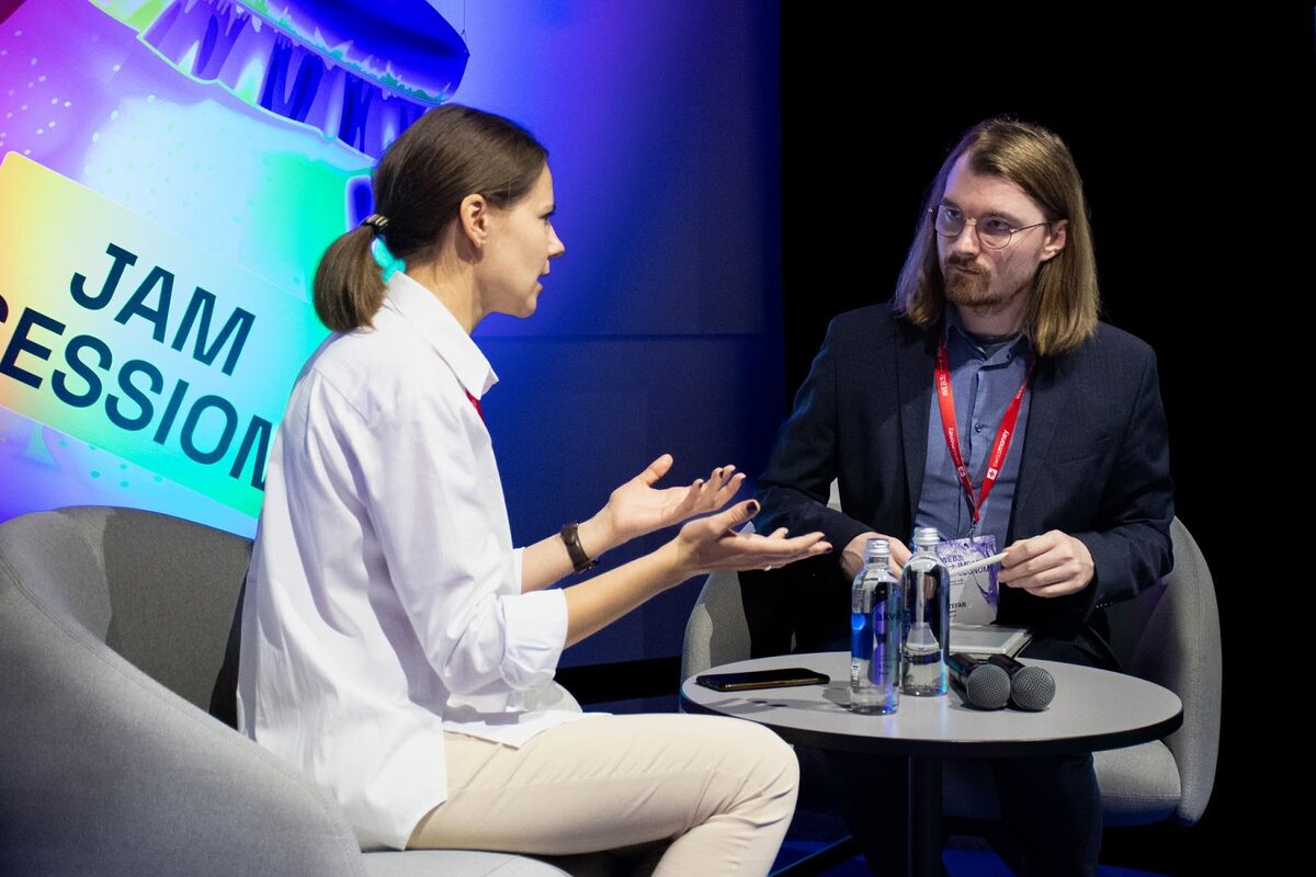 Micapass CEO Gintarė Košubienė speaking with DailyCoin Sections Editor Stefan Trapp.