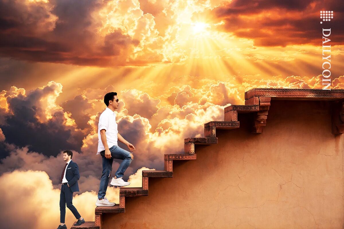 Man walking up the stairs above the clouds, whilst another much smaller man making his way down.