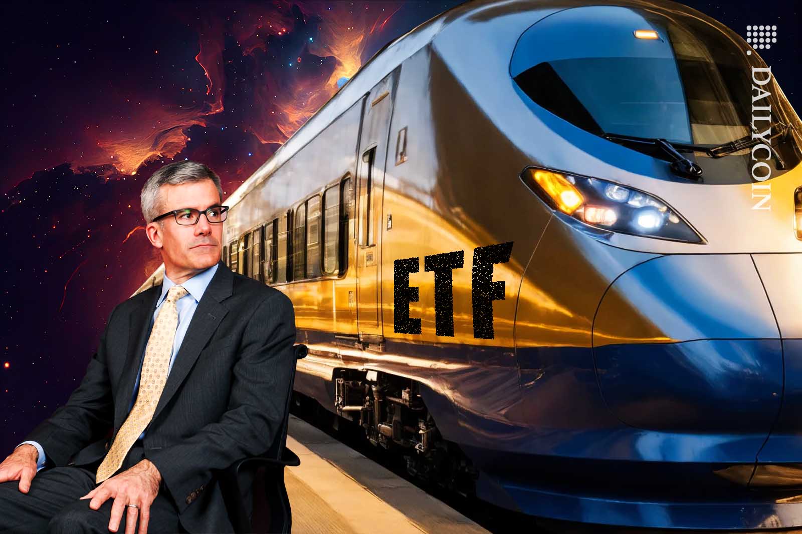 Mortimer Buckley of Vanguard turning his back to a golden ETF train.