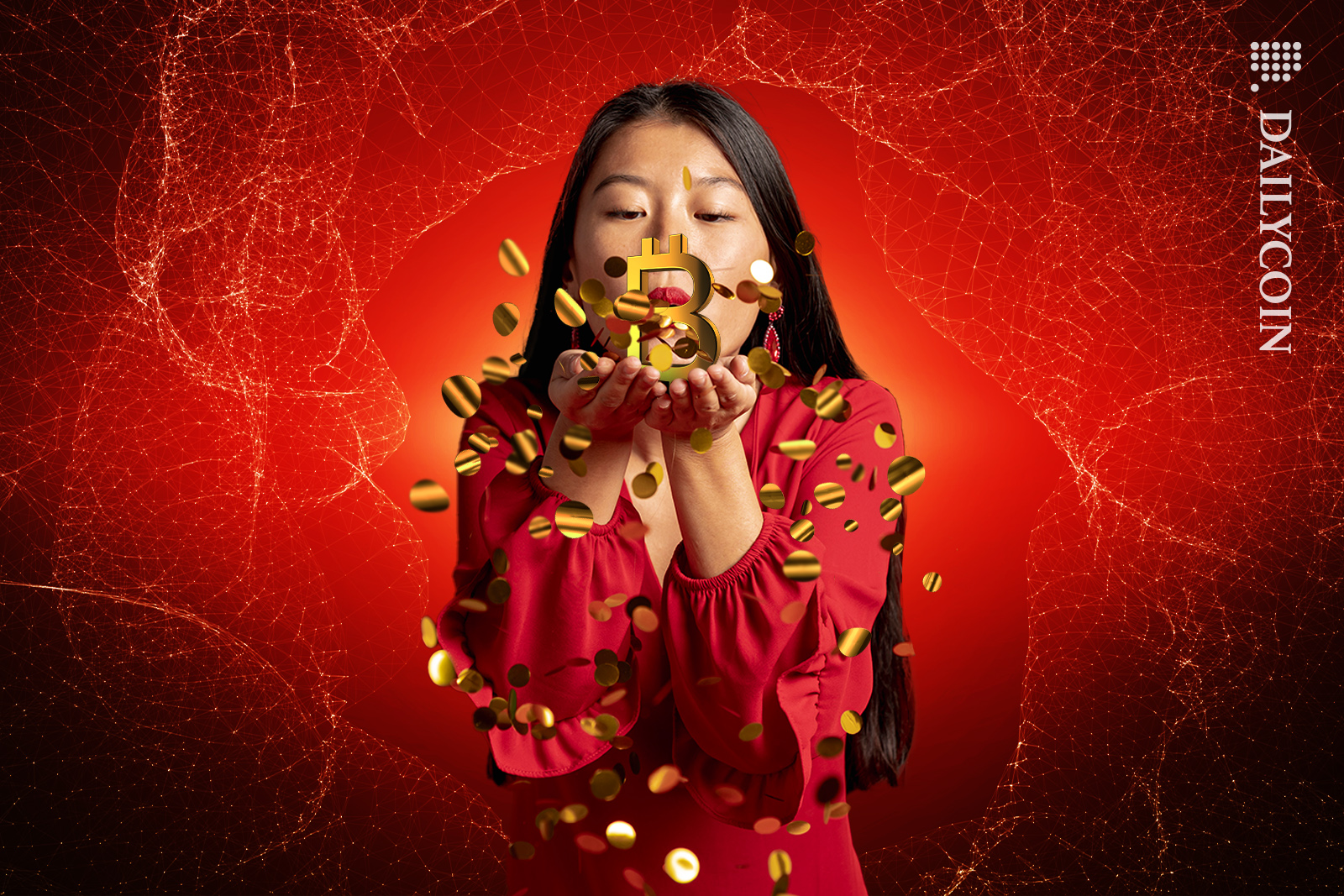 Chinese lady blowing a Bitcoin with confetti.
