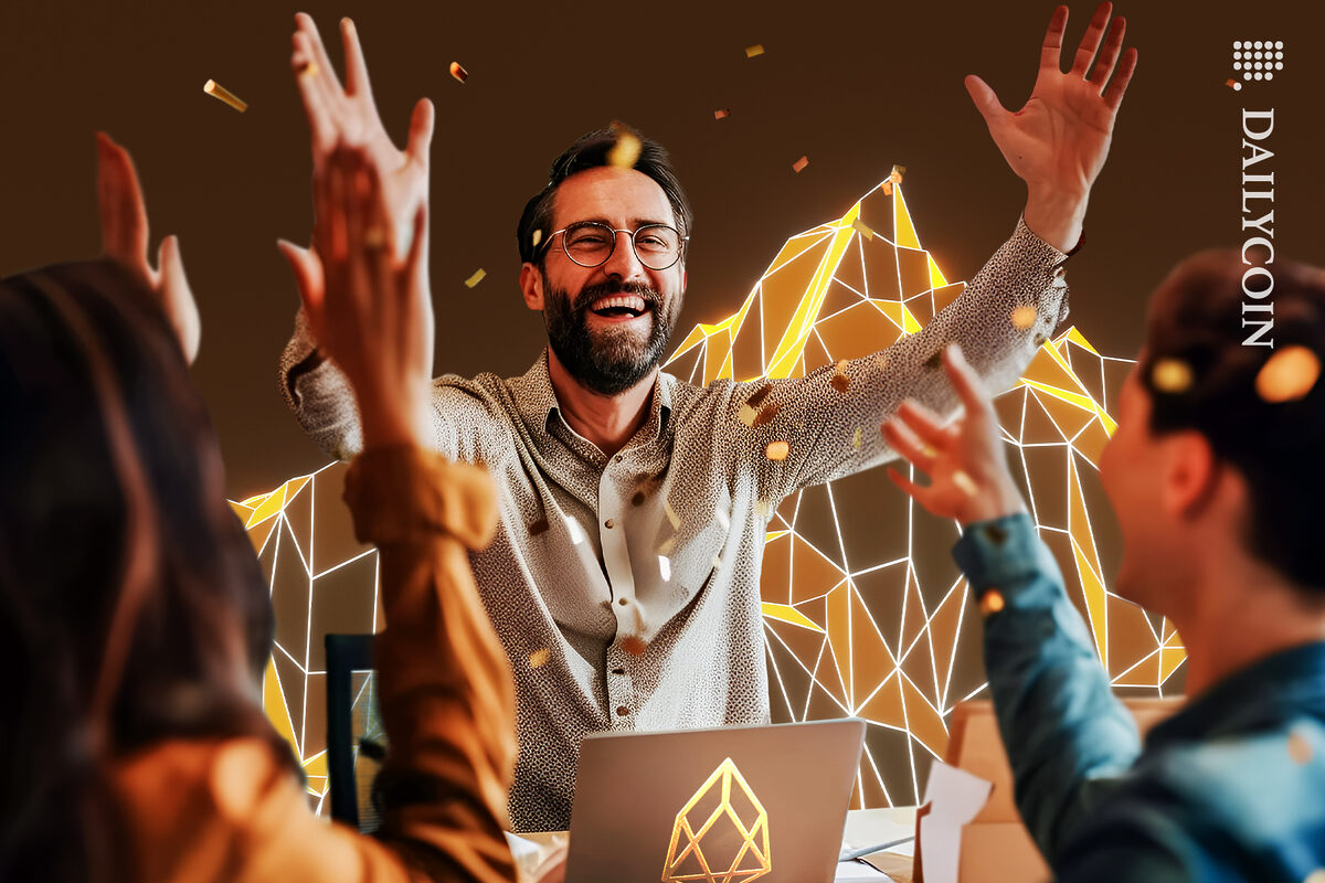 A group of people celebrating EOS coin.