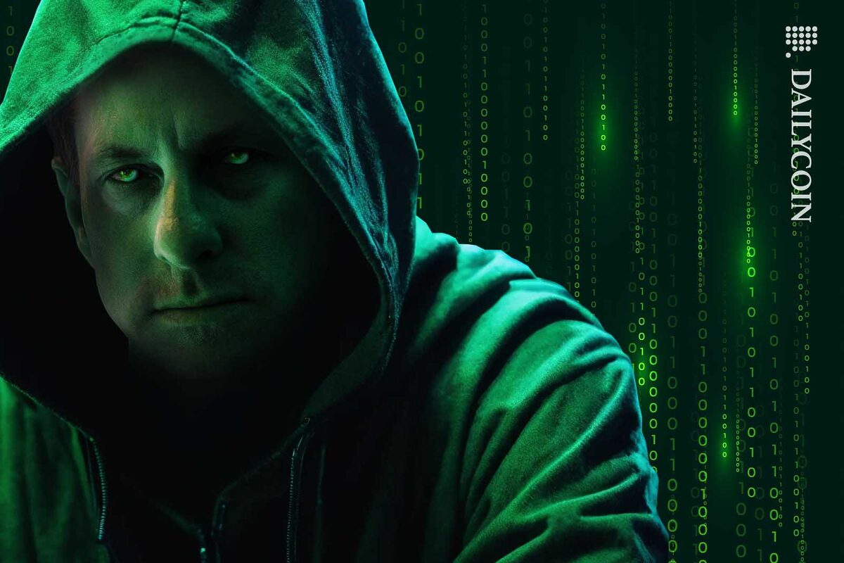 Chris Larsen portraid as a hacker, wearing a hoodie.