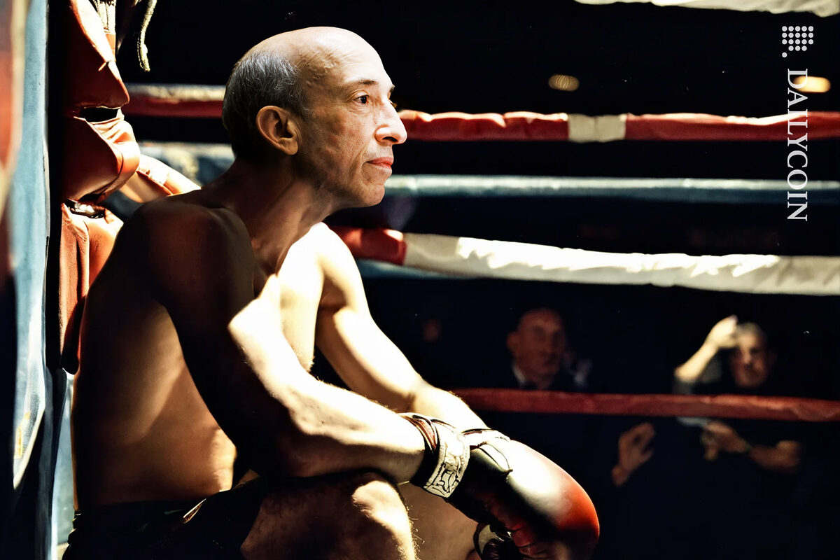 Gary Gensler sitting in the corner of a boxing ring, waiting for the next round.