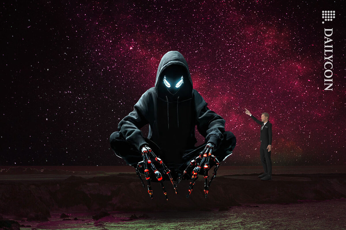 Man pointing at a giant hacker with robotic spider fingers sitting on a beach.