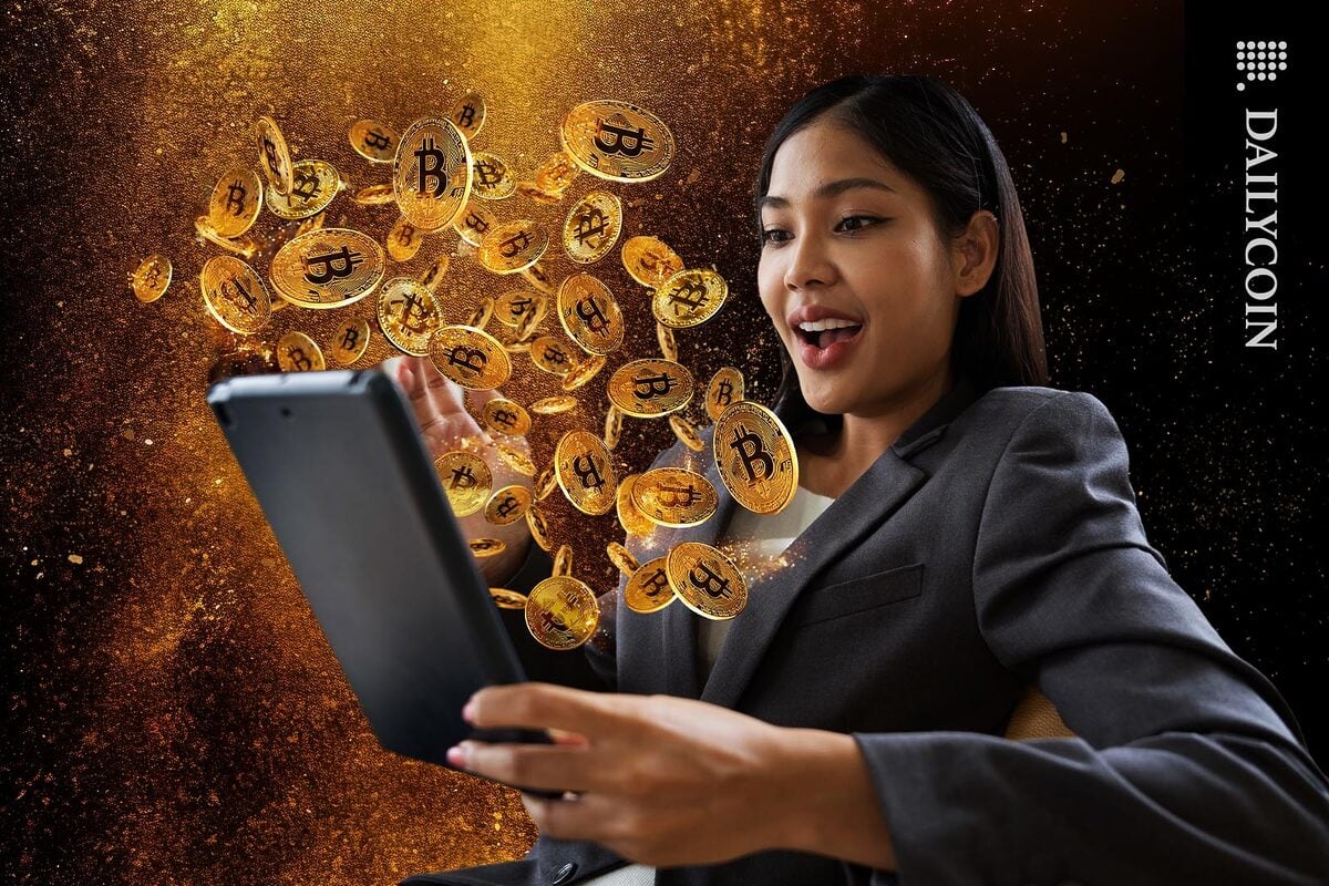 Girl has plenty of bitcoins coming out of her device.