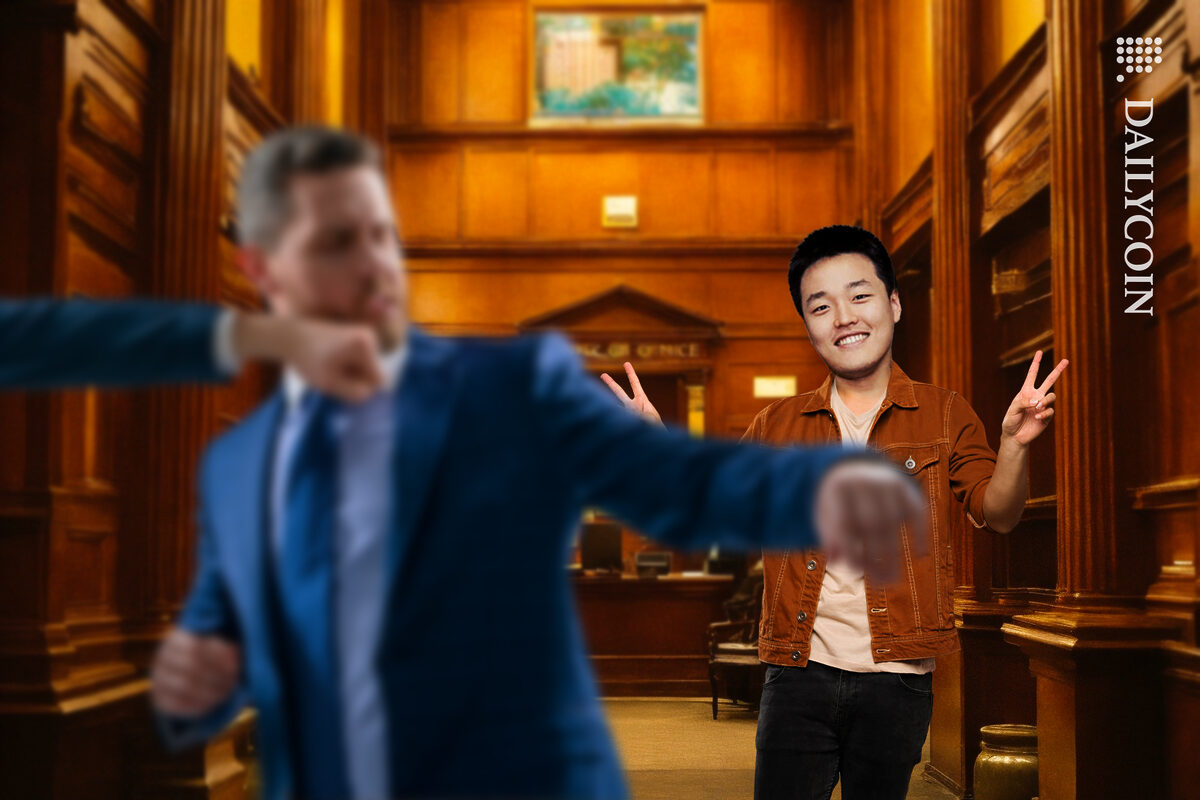 Do Kwon showing peace sign in a lawyers office, whilst lawyers are fighting.