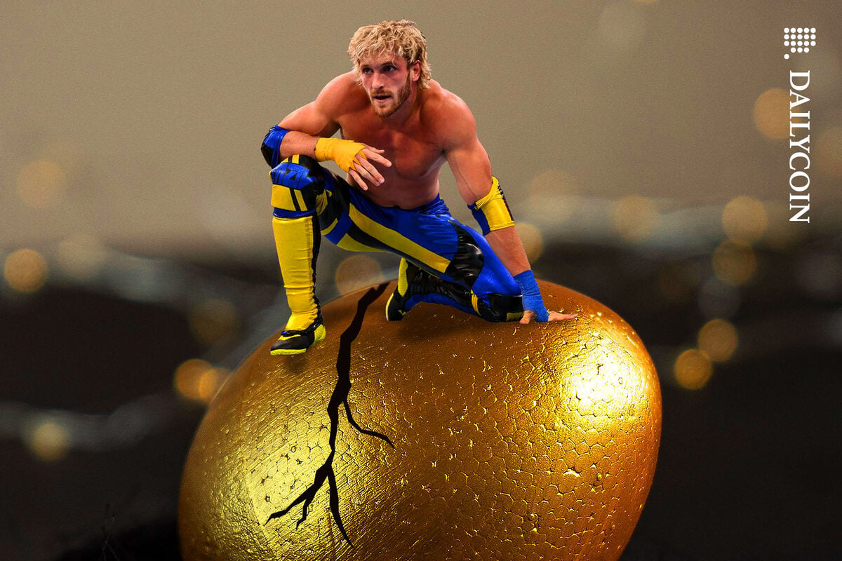 Logan Paul in wrestling gear on top of a golden egg
