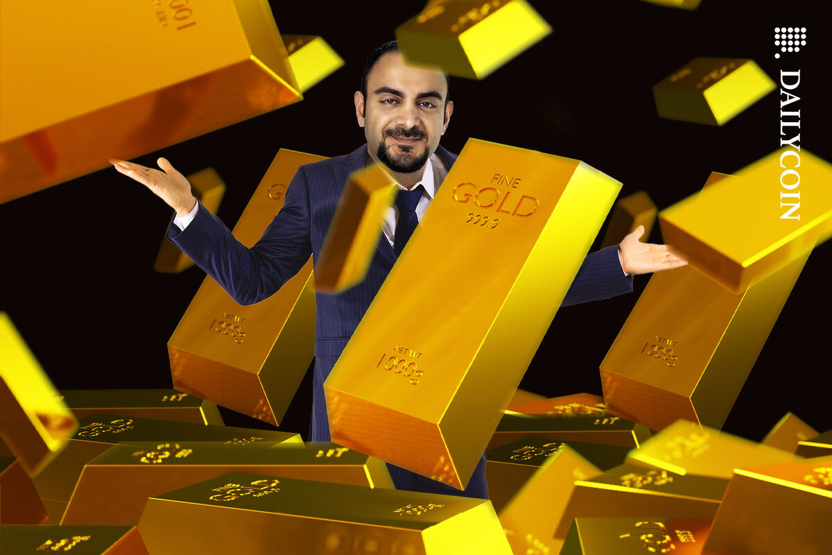 Michael Patryn surrounded by gold bars.