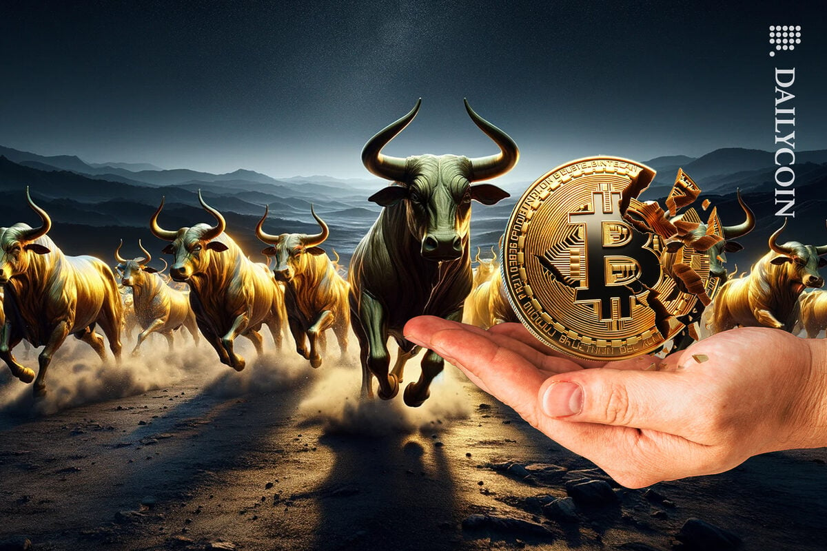 Bulls running towards a bitcoin crumbling in half