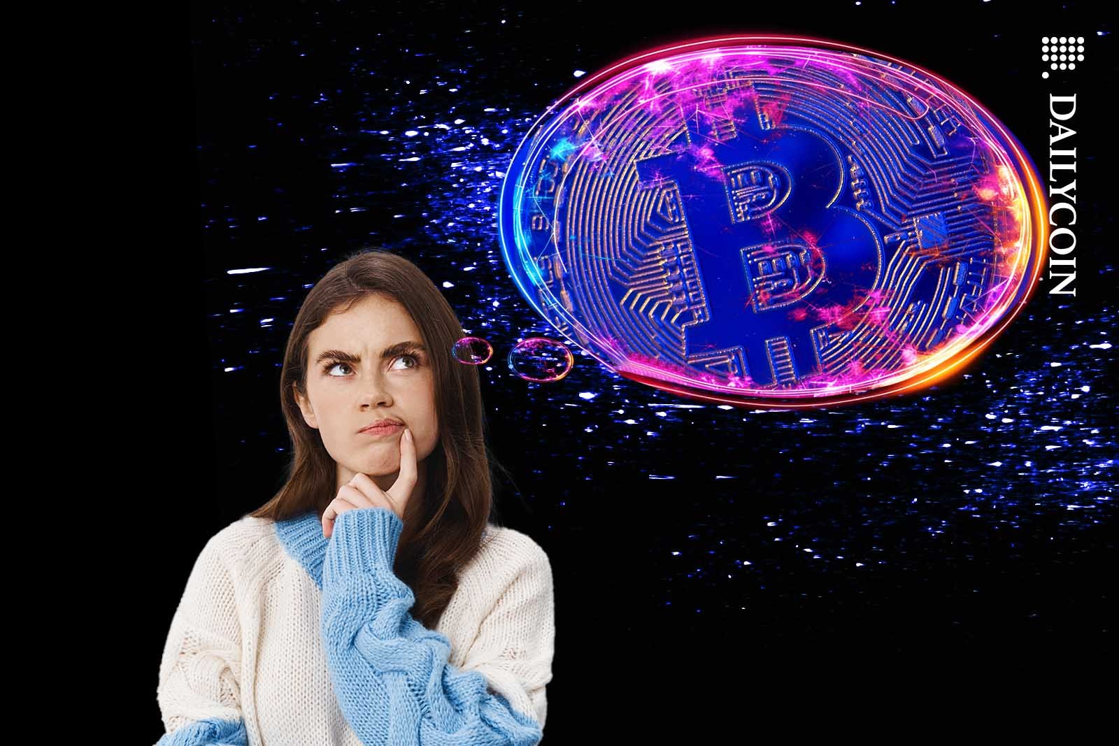 Woman thinking about Bitcoin.