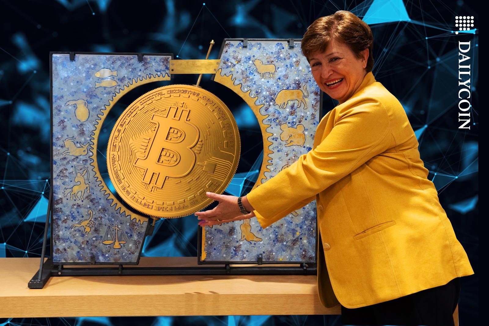 Kristalina Georgieva chief of IMF presenting a bitcoin.