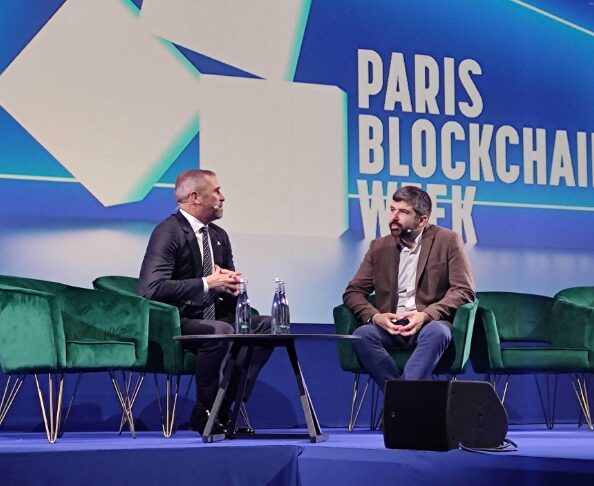 Presenters having a discussion at Paris Blockchain Week.