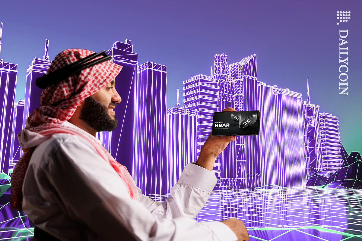 Guy in digital Qatar looking into Hedera.