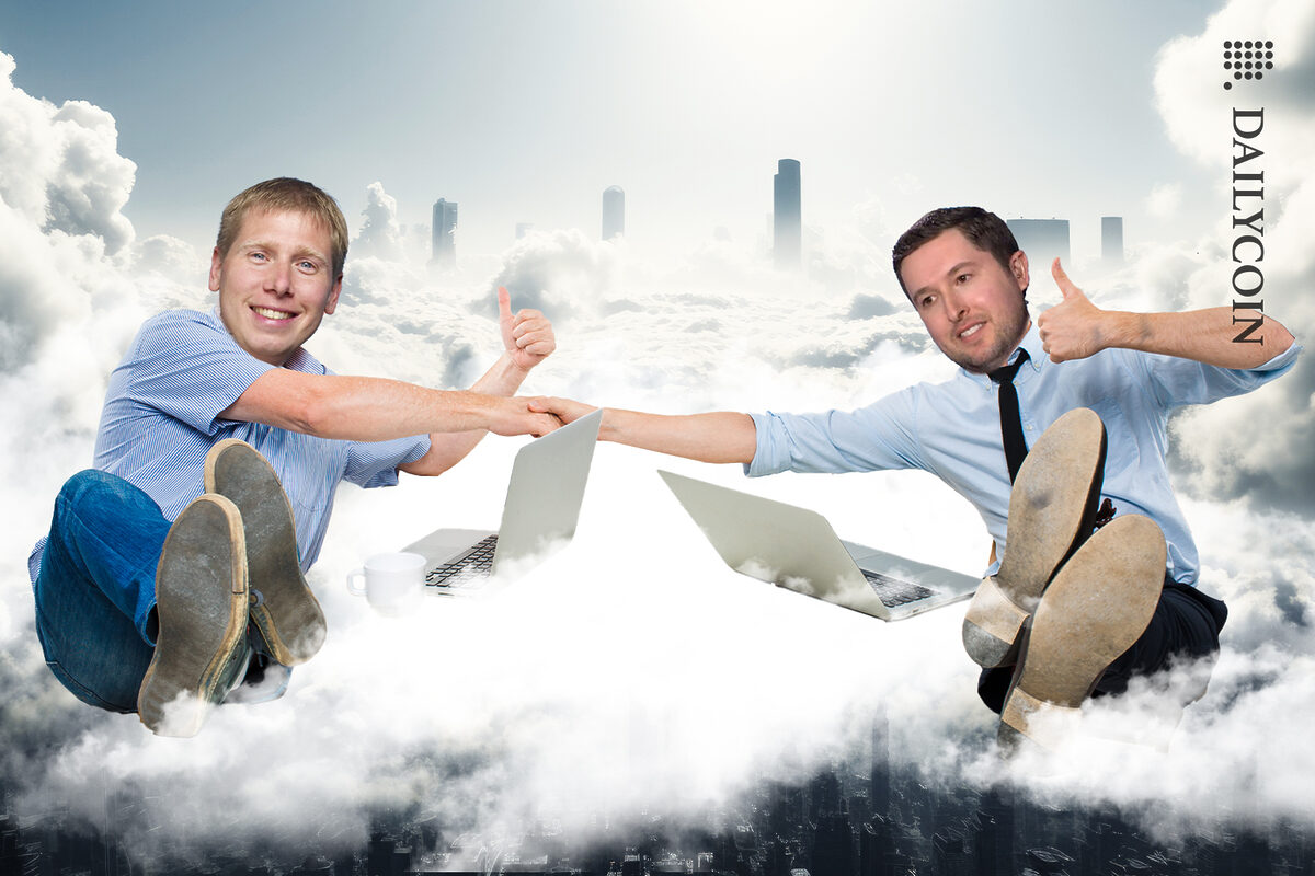 Barry Silbert and Michael Sonnenshein working together on building the gray city landscape whilst bein above in the clouds.