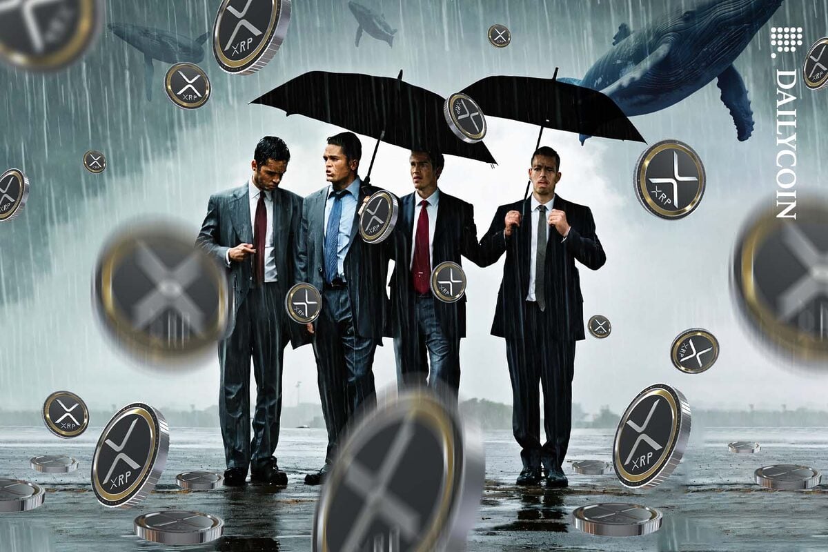 Four business men standing with umbrellas in a heavy downpour of rain and XRP coins.
