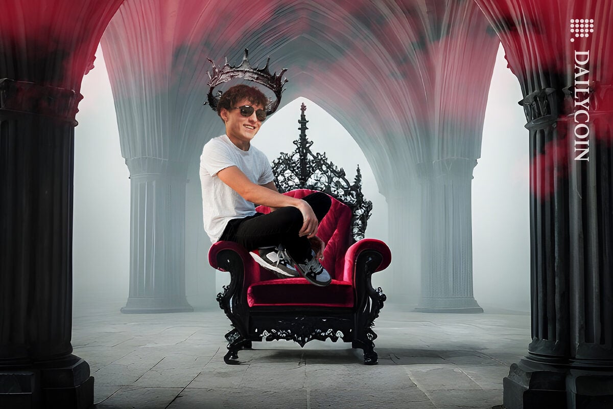 Aiden Pleterski sitting on a misterious throne with a rusty crown.