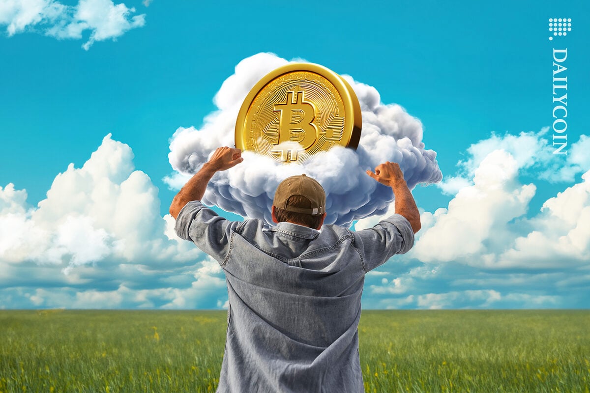 Guy celebrating a bitcoin floating on a cloud.